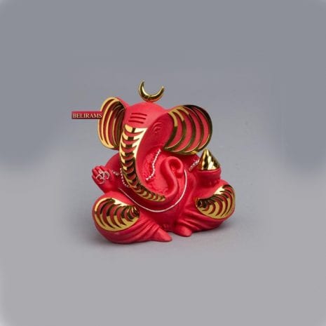 Reddish Ganesha with gold plated decorations | 3.7″