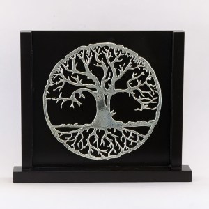 Circular metal Tree of Life sculpture mounted on a black display block.